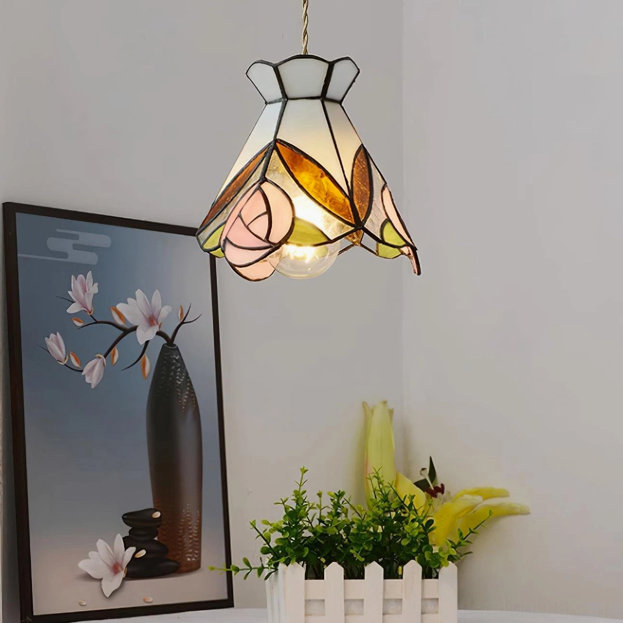 Tiffany rose pendant light fixture demonstrating atmospheric lighting and glass color coordination