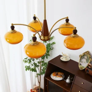 Tillary 5-head mid-century modern chandelier with amber glass shades, side overhead view in home setting