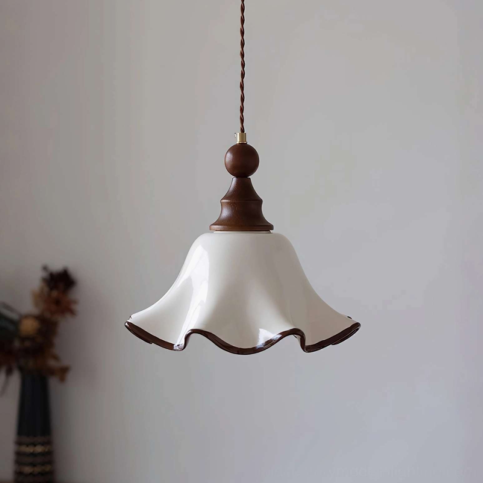Mid-century Toledo ruffled ceramic pendant lamp in minimalist vintage interior, soft warm glow illuminated