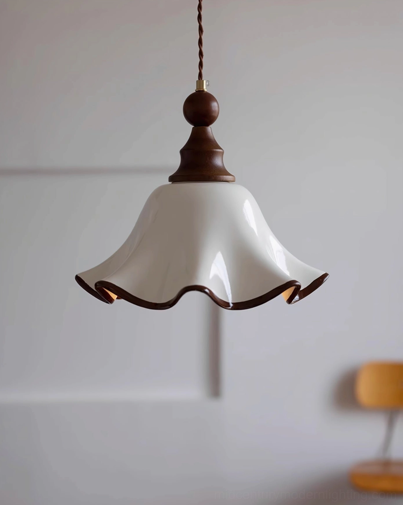 Toledo colonial vintage ceramic pendant light facing neutral wall with complementary wall lamp