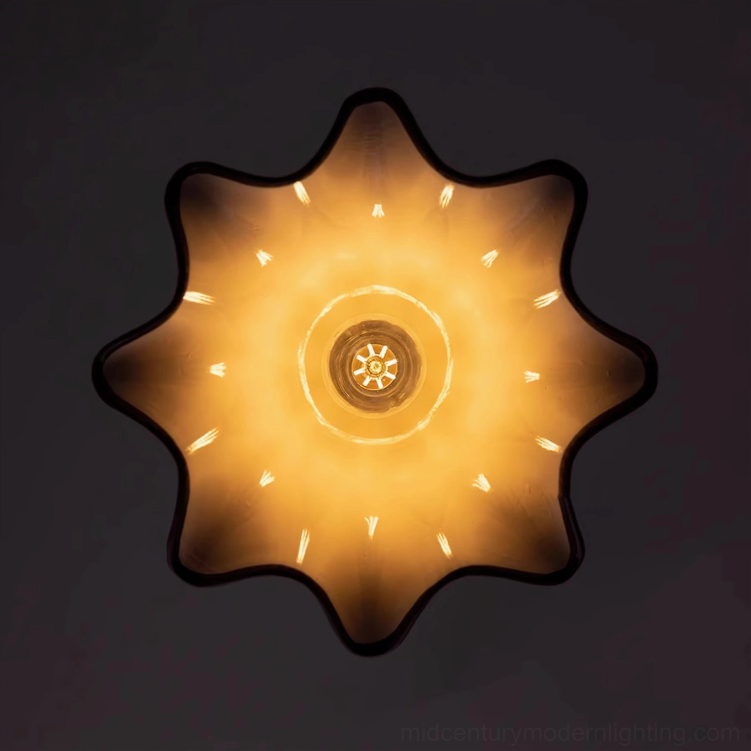 Multi-light Toledo pendant cluster installation showing spacing and design proportions