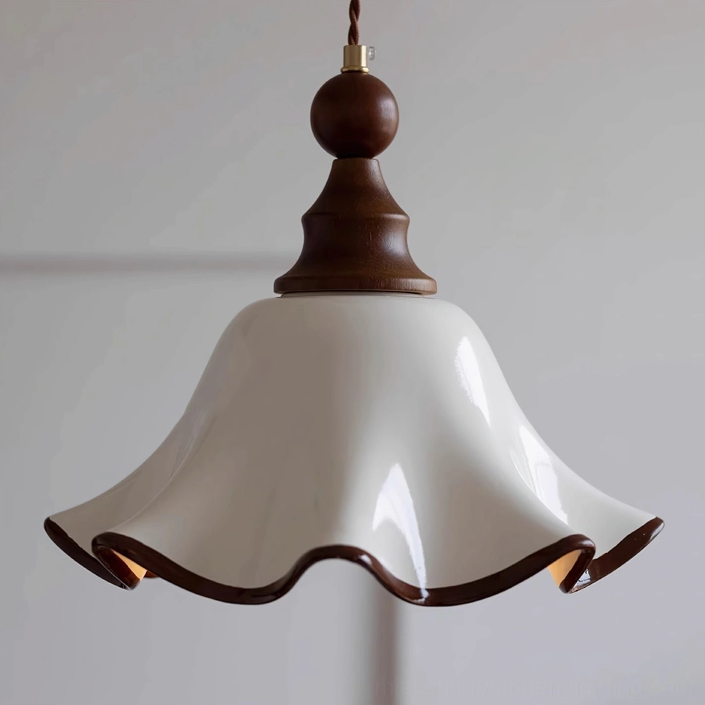 Toledo pendant light cluster detail shot showcasing wave-form ceramic shade and walnut wood construction