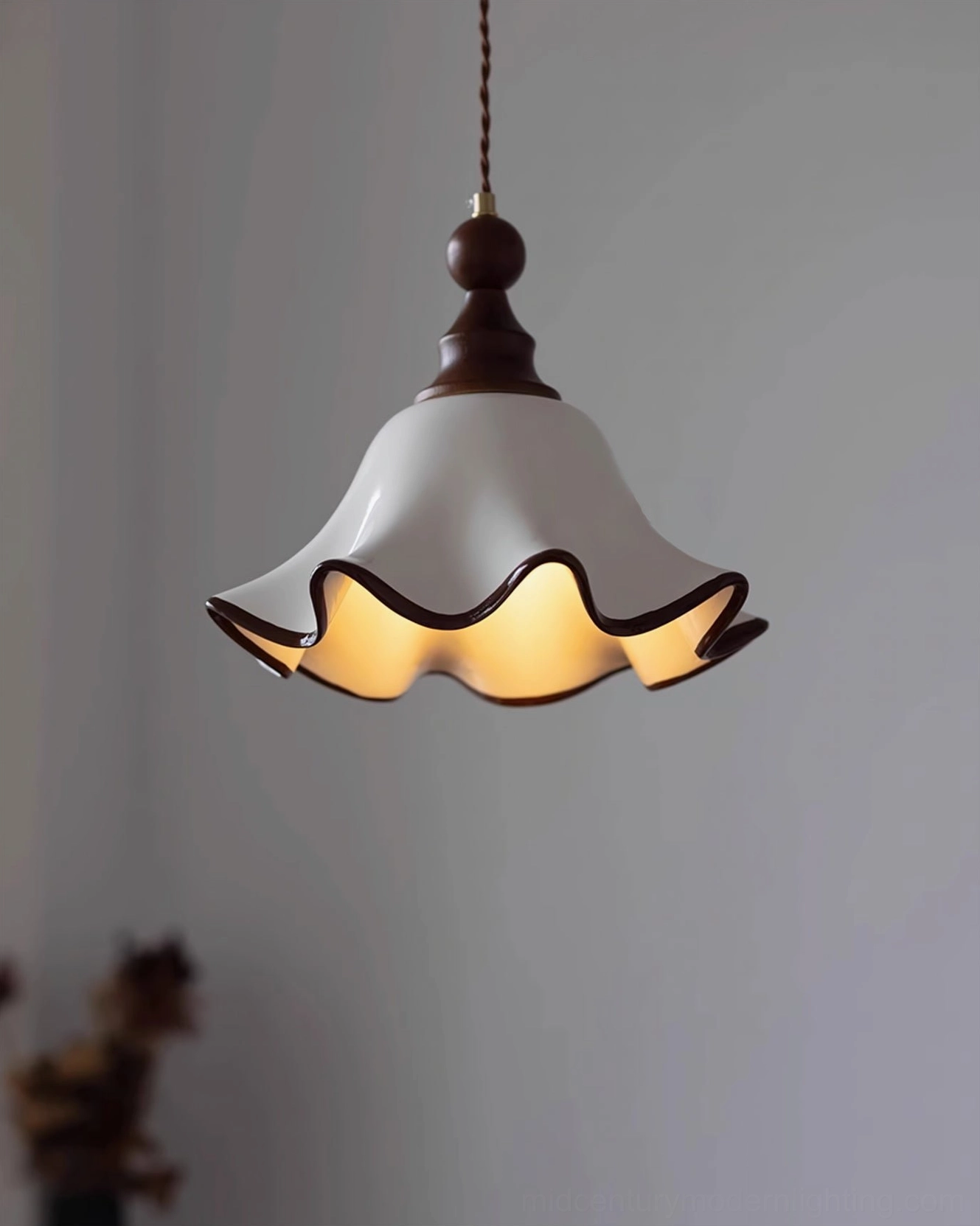 Toledo ruffled ceramic pendant shade from below, illuminated warm interior glow detail