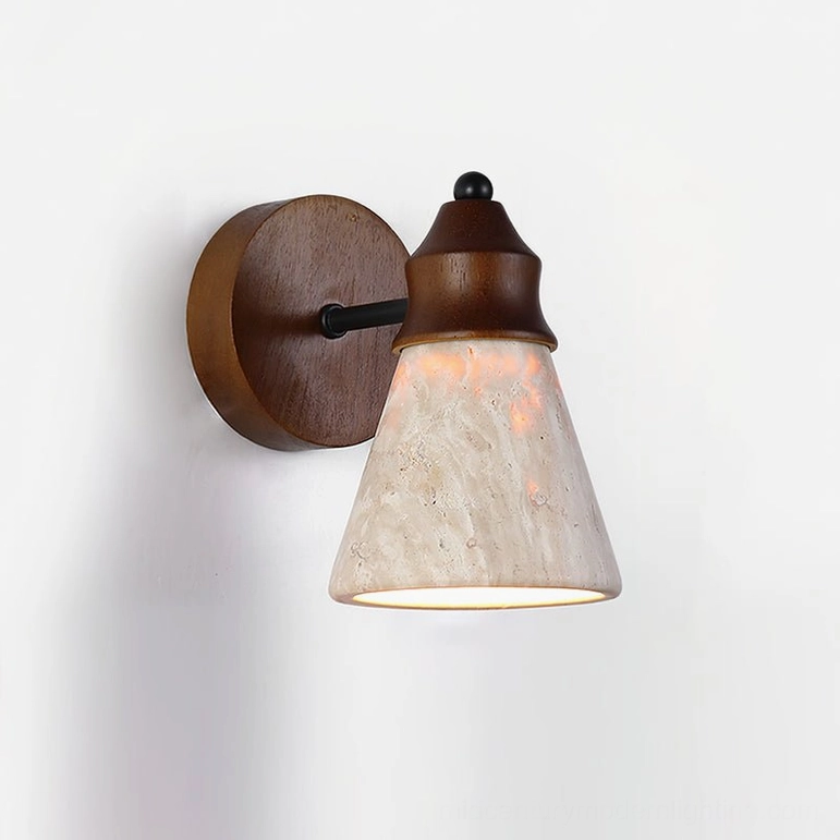 Toltec travertine wooden wall sconce, low angle frontal view showing solid walnut base and stone conical shade