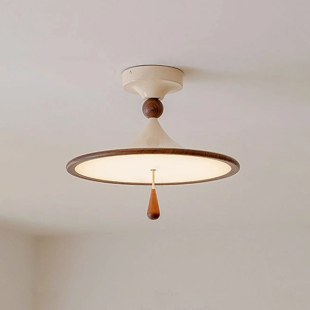Close-up detail of Tomaso ceiling light showing cream base, walnut wooden sphere joint, and frosted acrylic diffuser