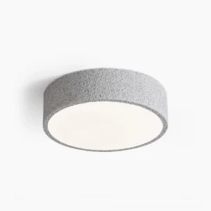 Toren brutalist ceiling light with speckled grey finish and white acrylic diffuser, front studio view
