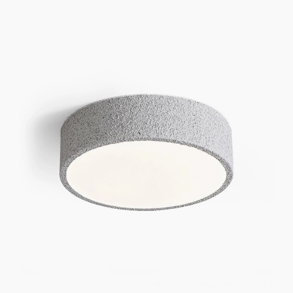 Toren brutalist ceiling light with speckled grey finish and white acrylic diffuser, front studio view