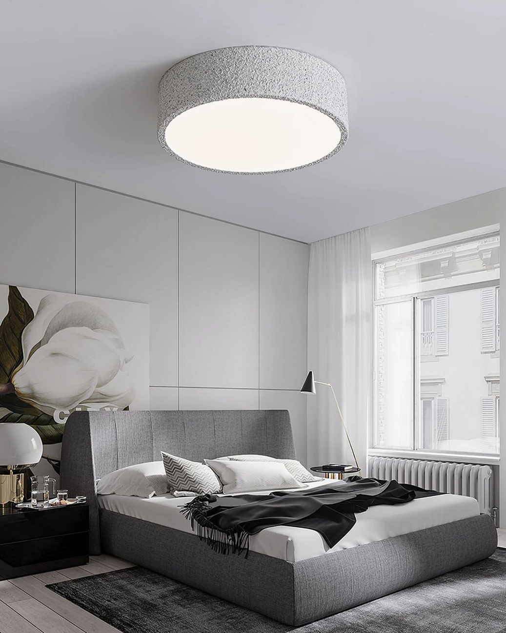 Toren ceiling light in modern bedroom with floral wall art and grey upholstered bed