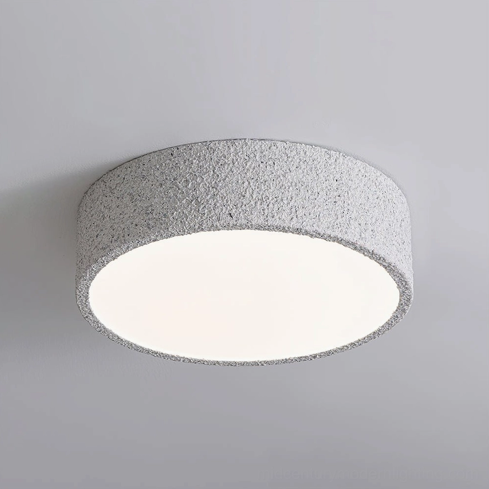 Low-profile flush mount Toren ceiling light showing textured grey frame and frosted white panel
