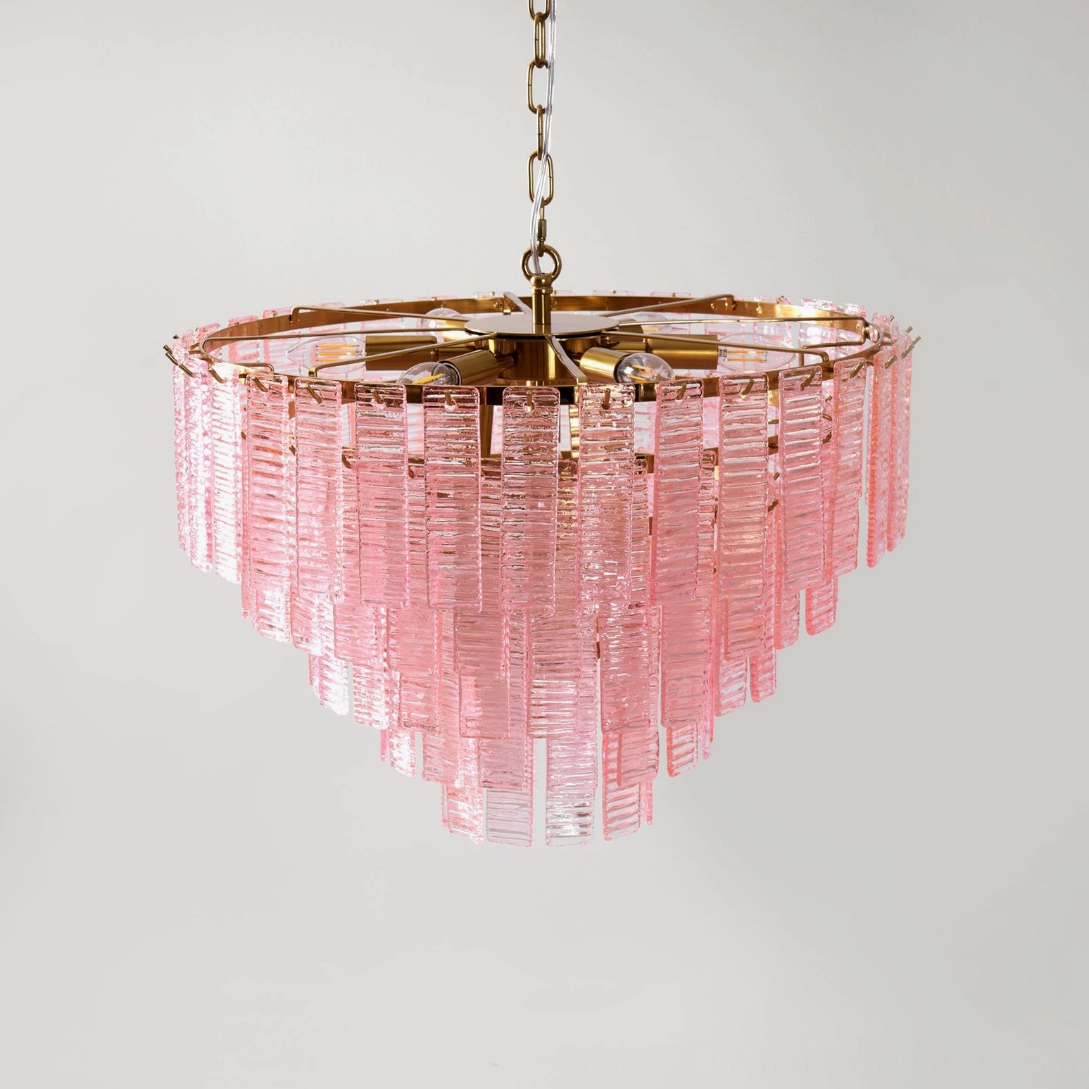 Toronto chandelier clear glass version installed showing light distribution and ambient effect