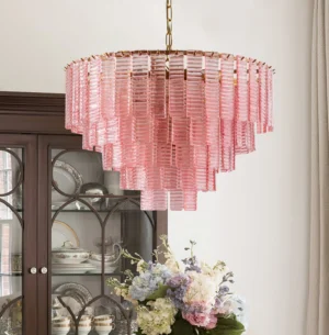 Toronto chandelier installed in luxury modern dining room with floral centerpiece and warm ambient lighting