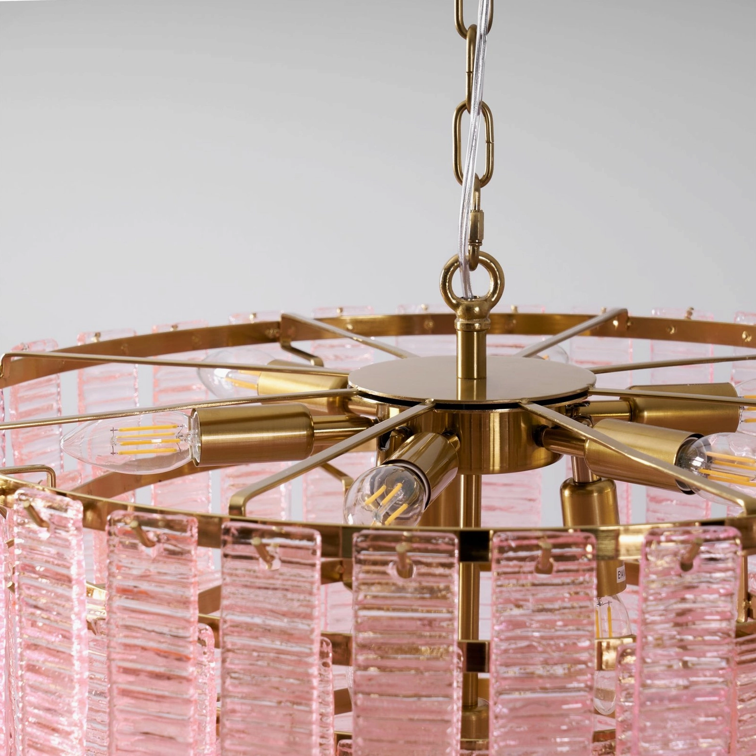 Toronto chandelier hanging display showing suspension chain and brass hardware assembly