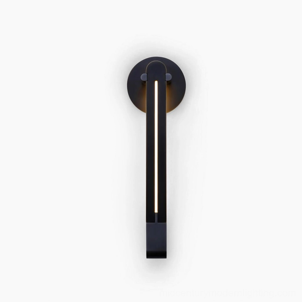 Torpedo LED wall sconce in matte black finish, front view on white background showcasing elongated minimalist brass-inspired design