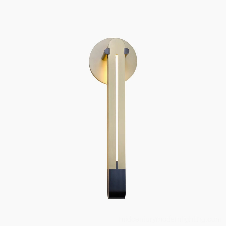 Torpedo wall sconce in brass and black mixed-metal finish installed showing warm and cool light color temperature options
