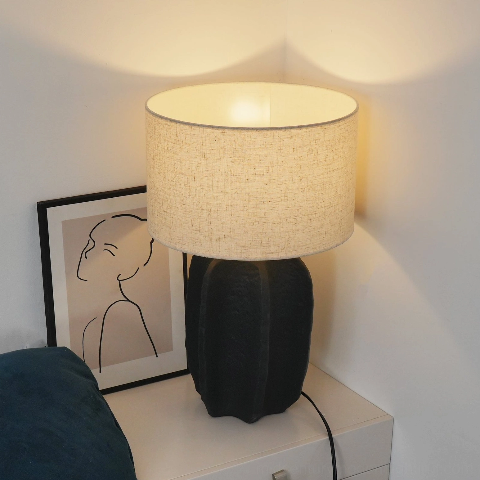 Torso ceramic table lamp detail shot showing base texture and construction