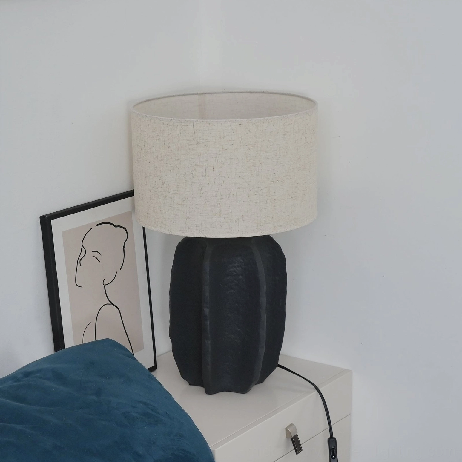 Torso modern table lamp in minimalist interior design setting