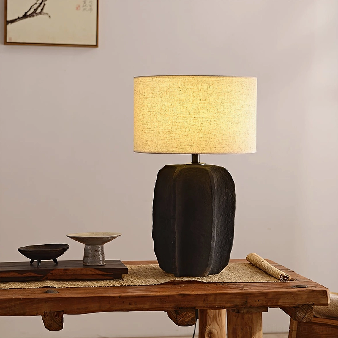 Torso modern desk lamp on wooden dining table showing consistent minimalist design