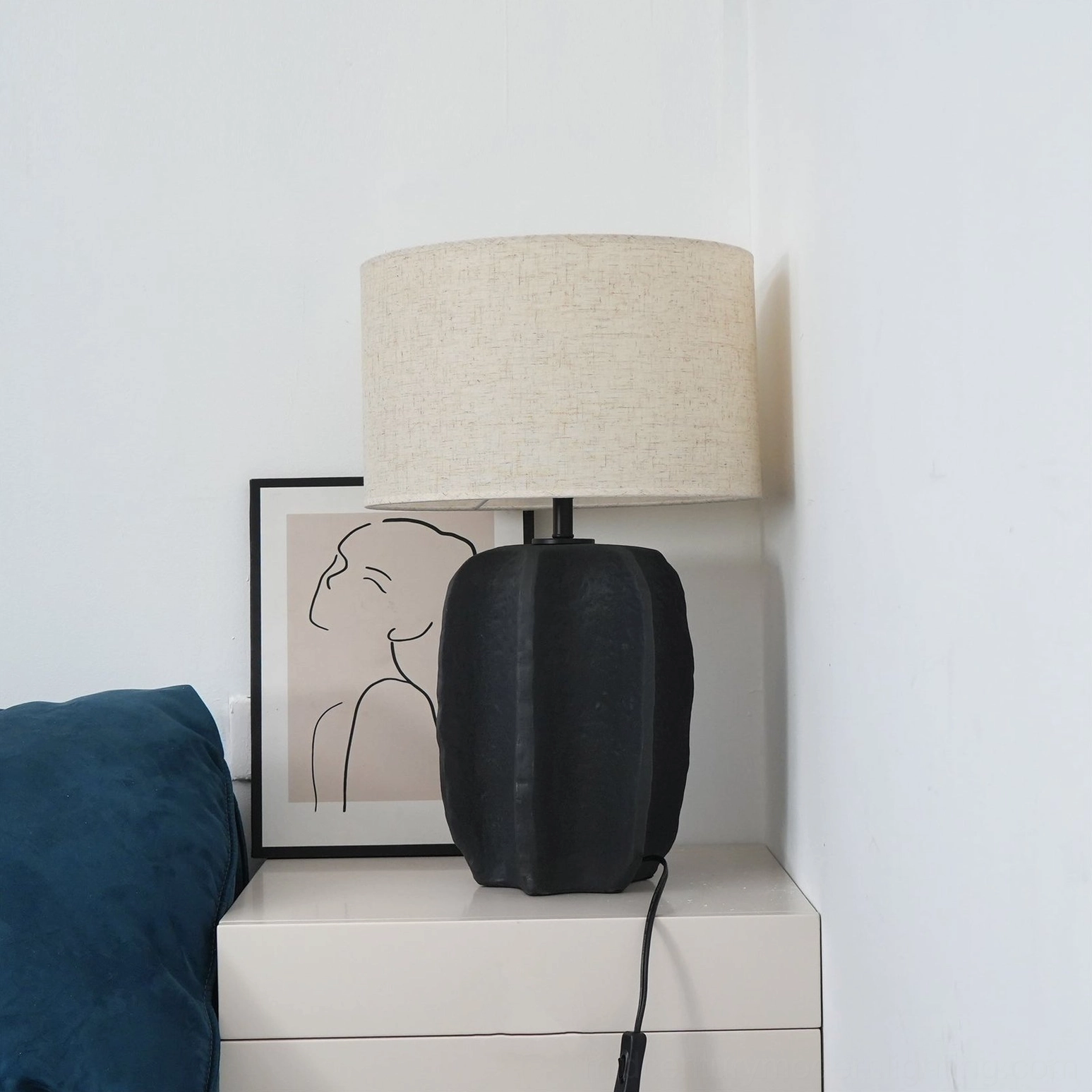 Torso ceramic table lamp showing push button switch and cord assembly