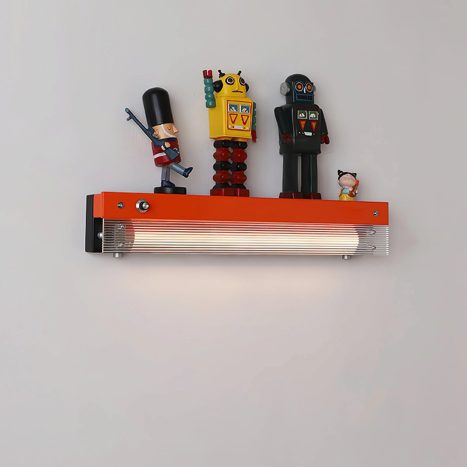 Totem wall lamp illuminated with multiple robot figurines and warm LED lighting effect