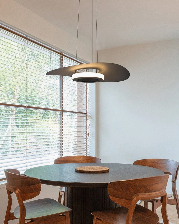 Towers LED pendant lamp above wooden dining table minimalist style