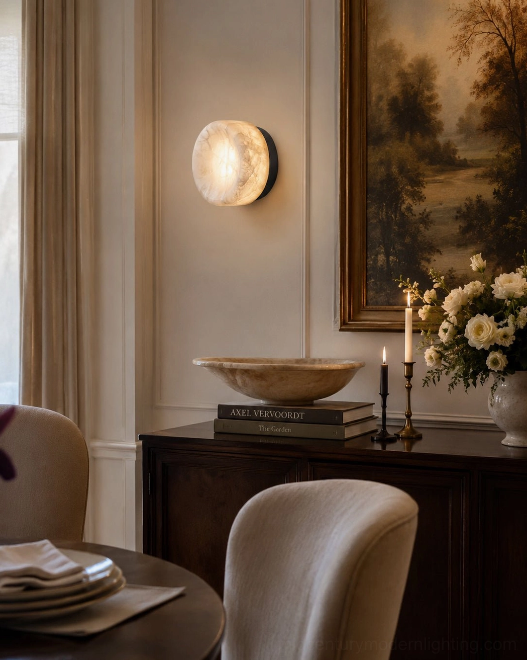 White alabaster and brushed brass sconce detail showing translucent stone veining and organic material quality