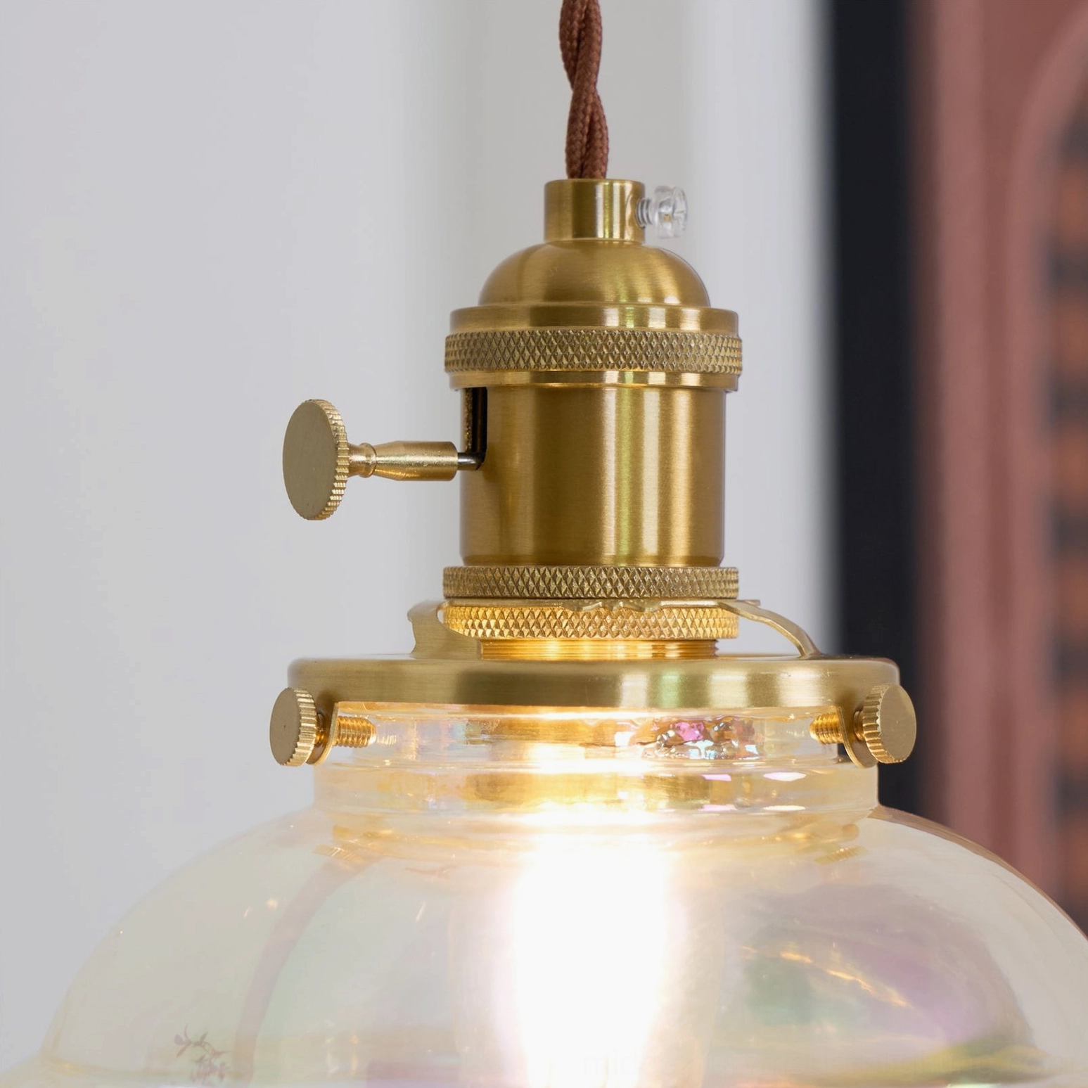 Transparent resin water droplets pendant with internal lighting creating ethereal glow