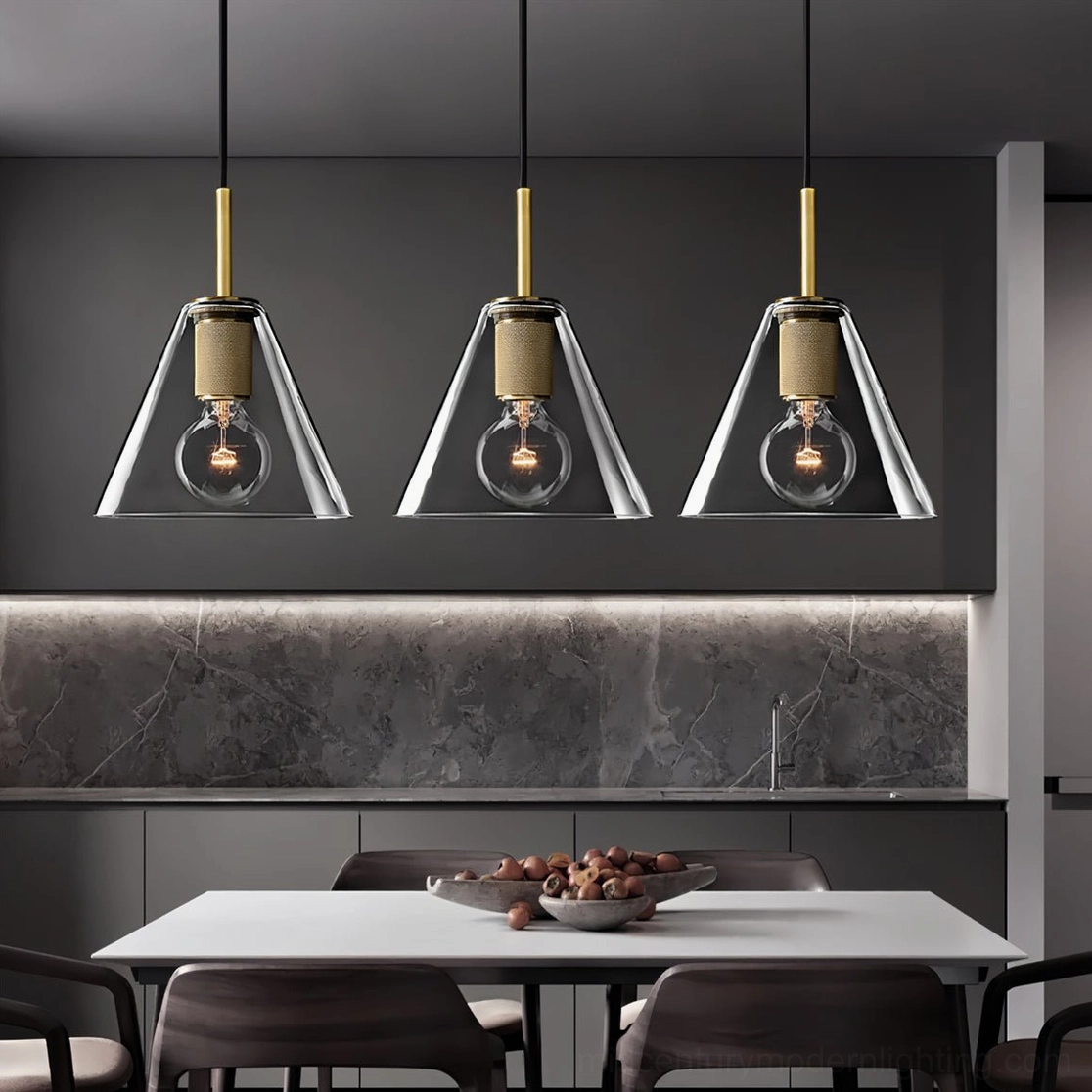 Three-piece trapezoid brass pendant lamp set in modern kitchen dining area