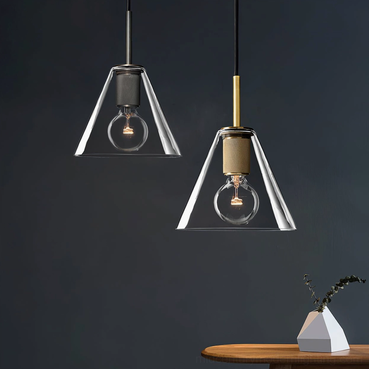 Trapezoid glass shade pendant lights with polished brass hardware detail