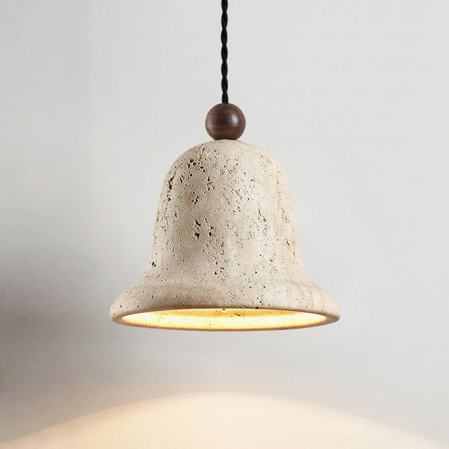 Bell travertine pendant architectural detail showing sculptural form and stone craftsmanship