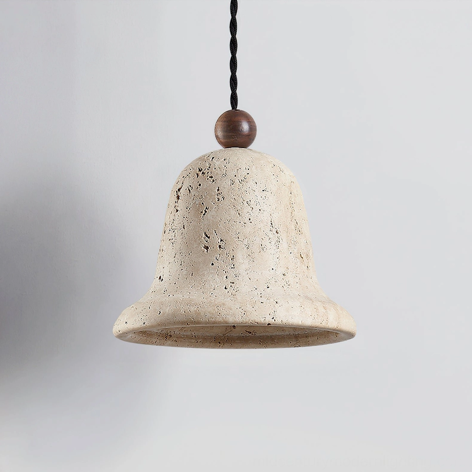 Travertine bell pendant in contemporary interior setting demonstrating mid-century modern styling