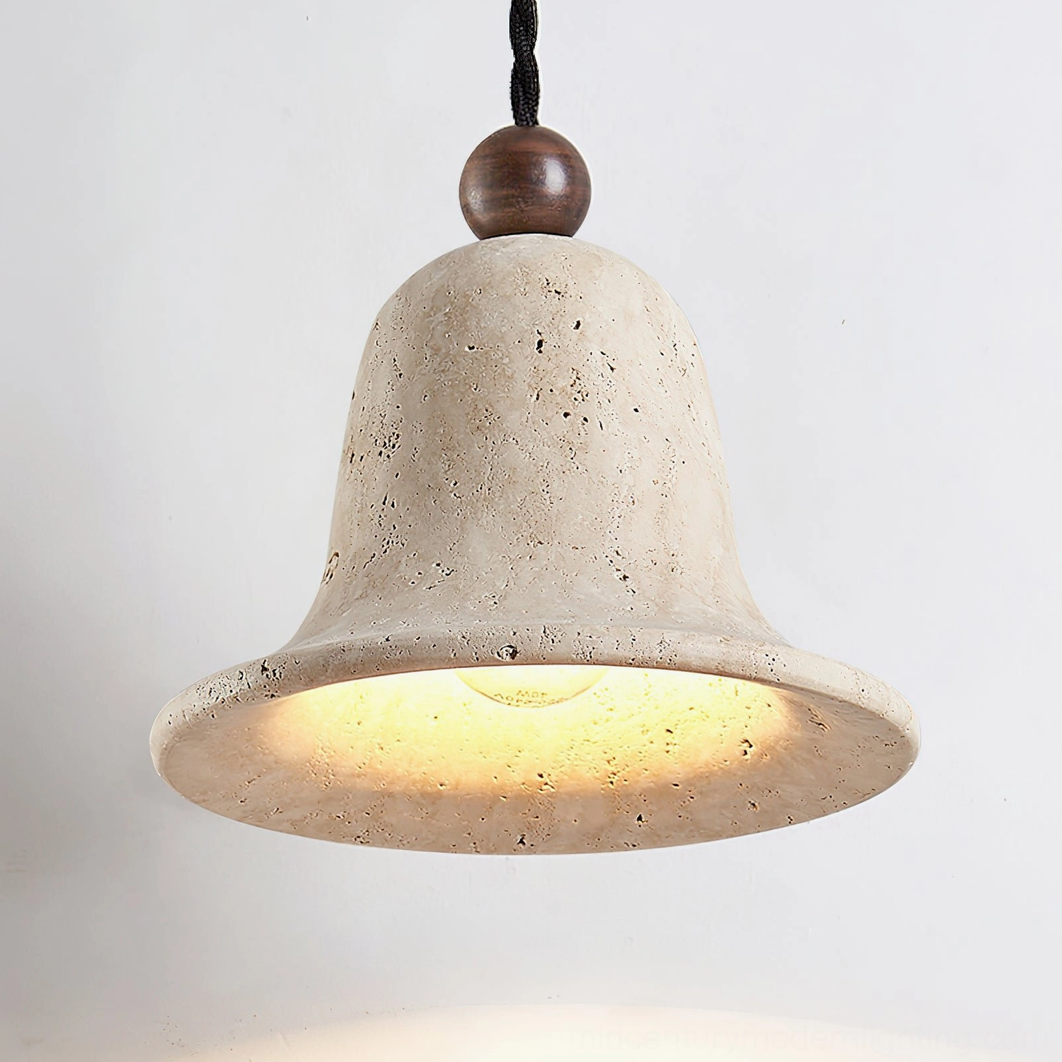 Bell travertine pendant installation detail with ceiling mount hardware and cord connection
