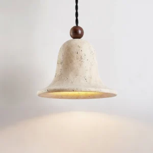 Low-angle view of illuminated travertine bell pendant with twisted black cord and warm interior glow