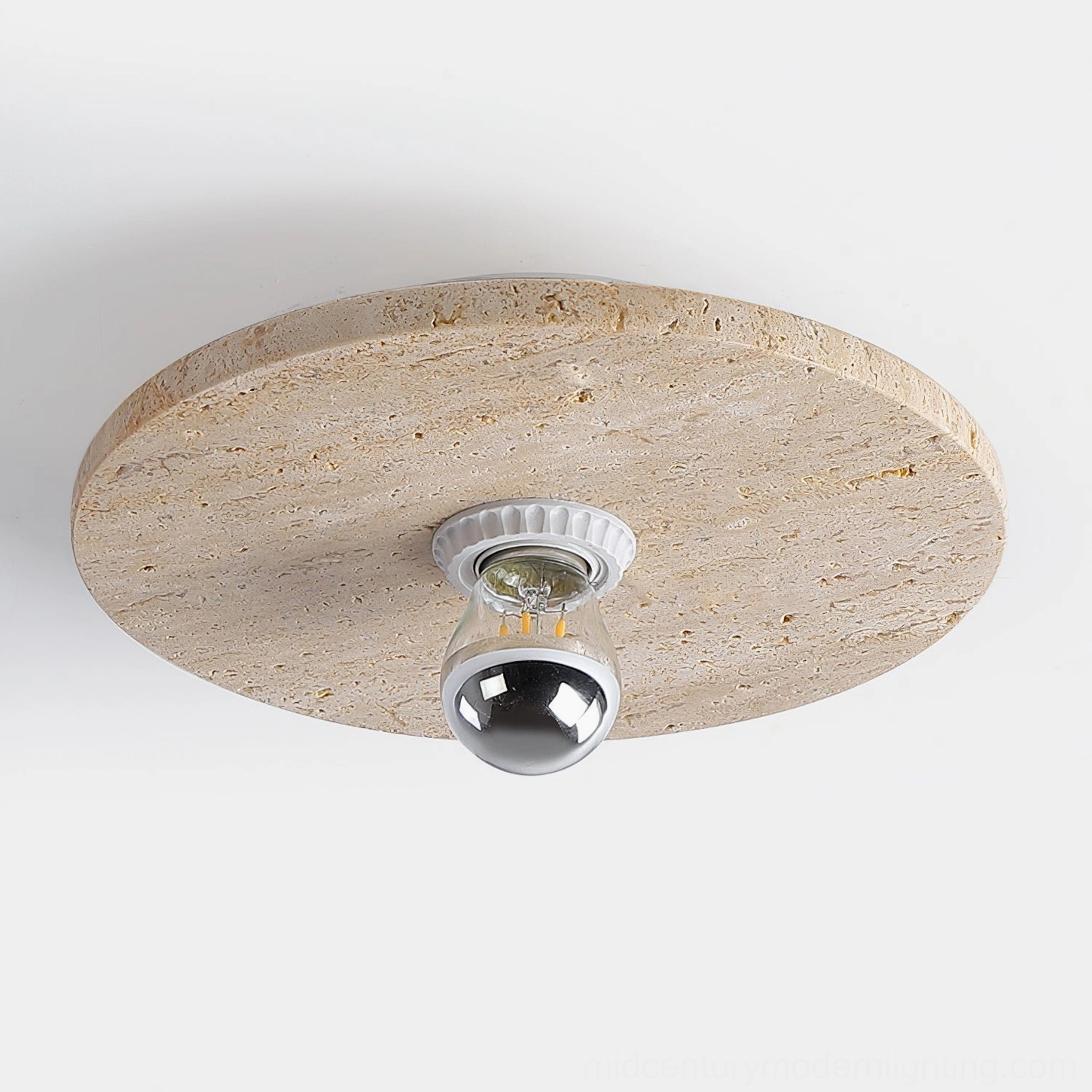 Modern travertine flush mount ceiling light natural stone porous surface close up macro photography