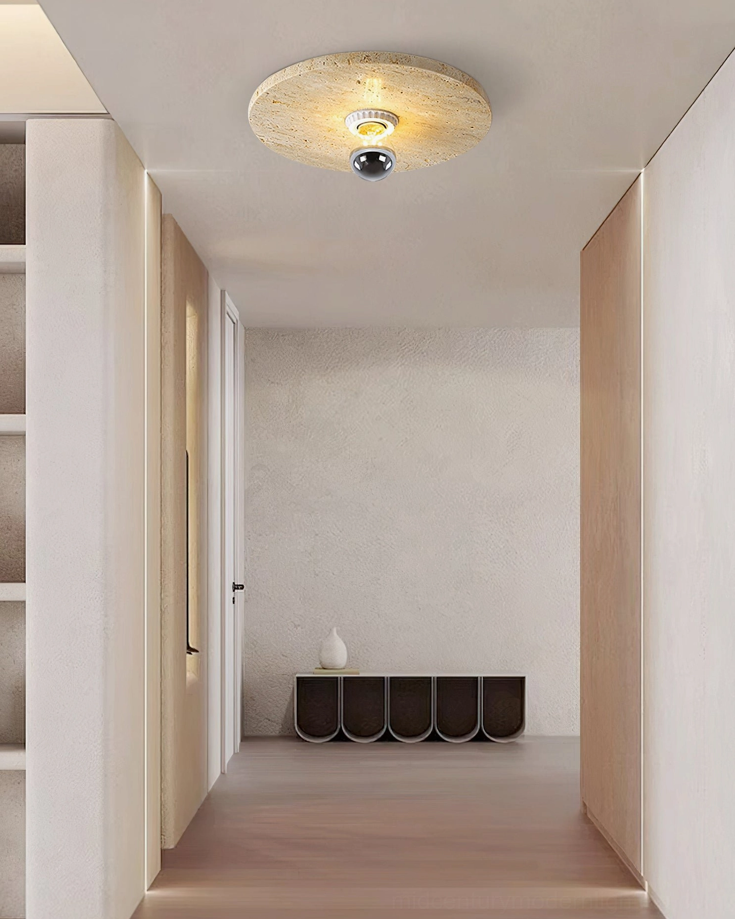 Long narrow residential corridor with travertine stone ceiling light neutral minimalist hallway interior
