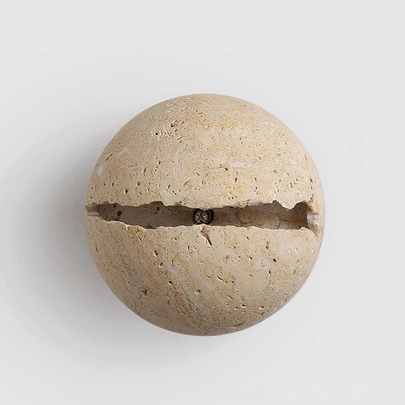 Unlit round travertine wall sconce showing natural crack pattern and mounting hardware detail