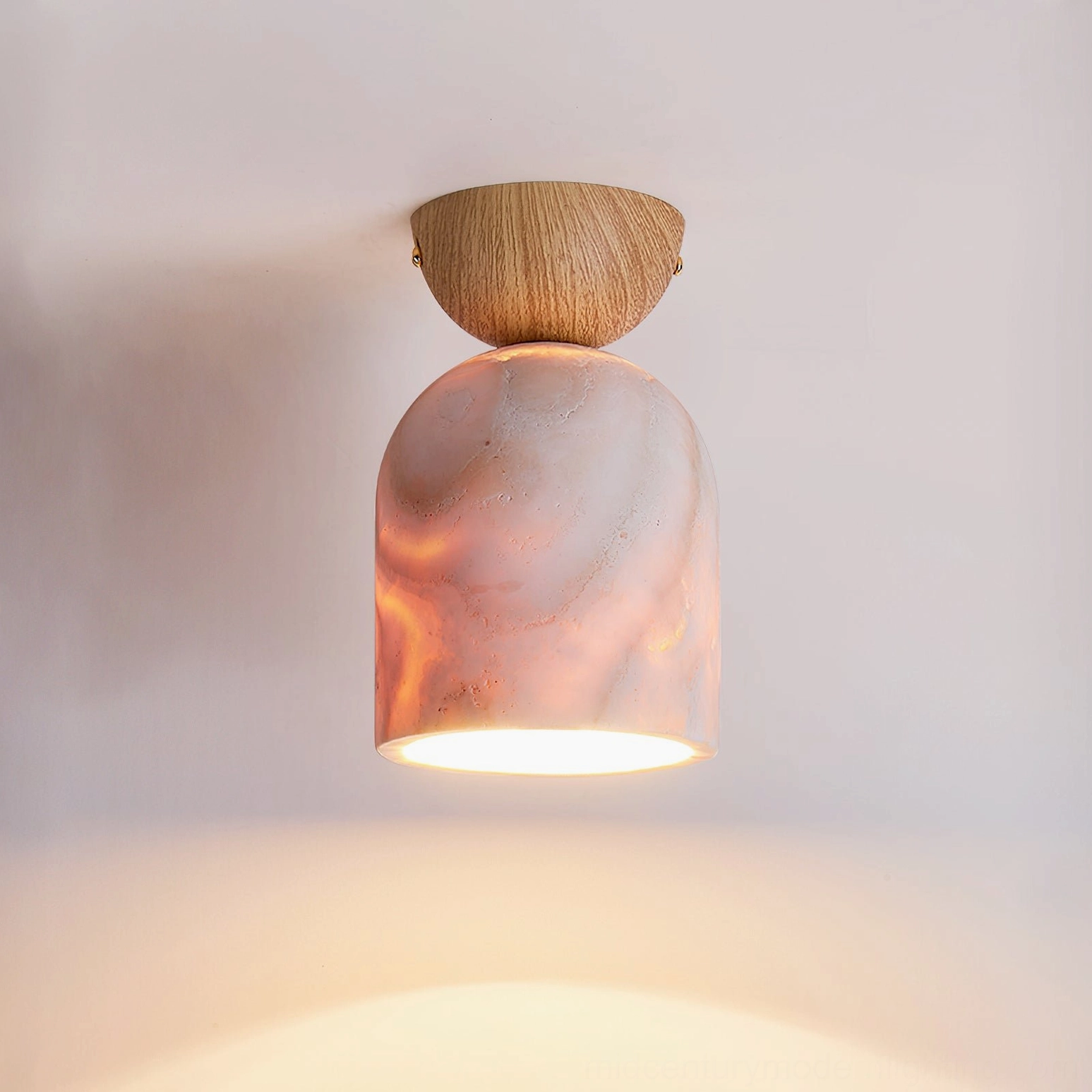 Travertine pendant light fixture showing complete assembly with wood cap and natural stone shade details