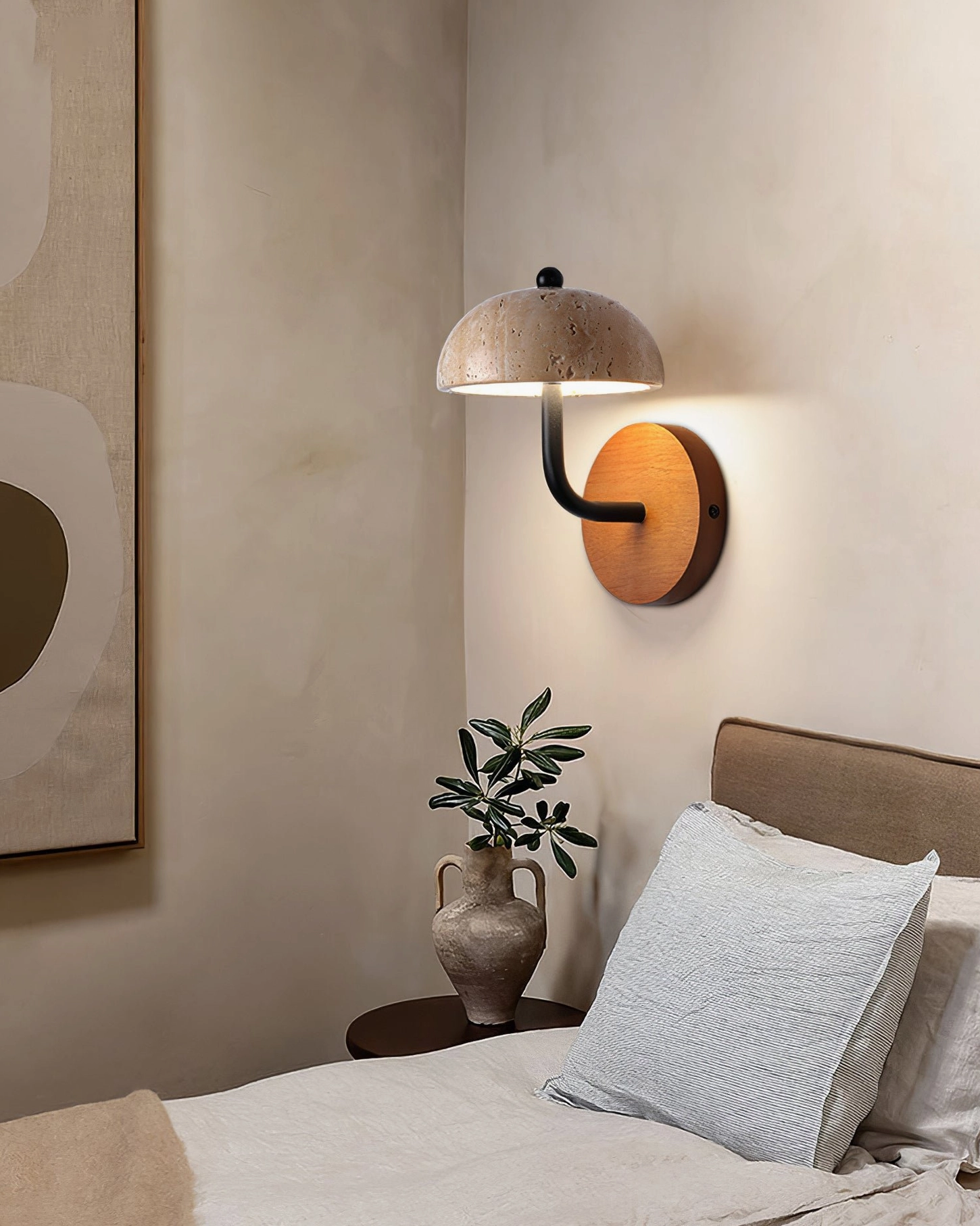 travertine stone lamp shade lit up demonstrating warm light diffusion through porous surface