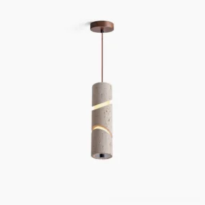 Travertine sculptural pendant lamp with spiral light cutouts shown in overhead studio view, revealing intricate carved pattern and natural stone texture
