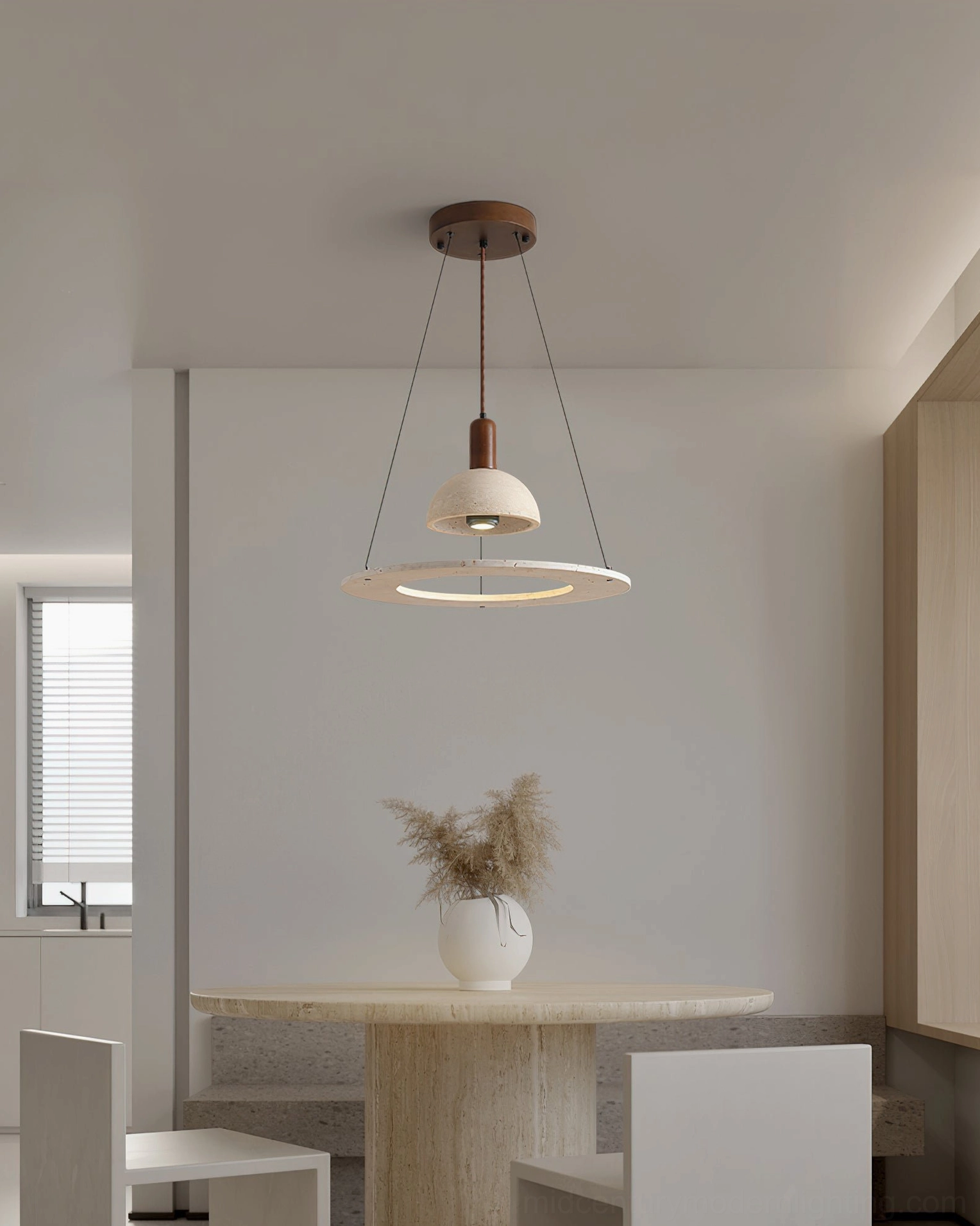 Wide shot of travertine pendant light in small modern apartment dining area with warm minimalist decor