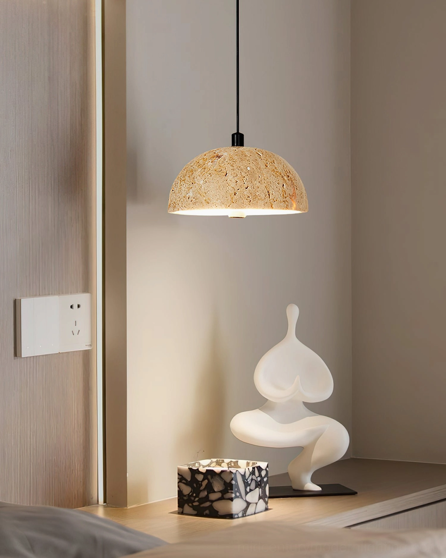 Morphe travertine pendant light bedroom side installation with abstract art sculpture