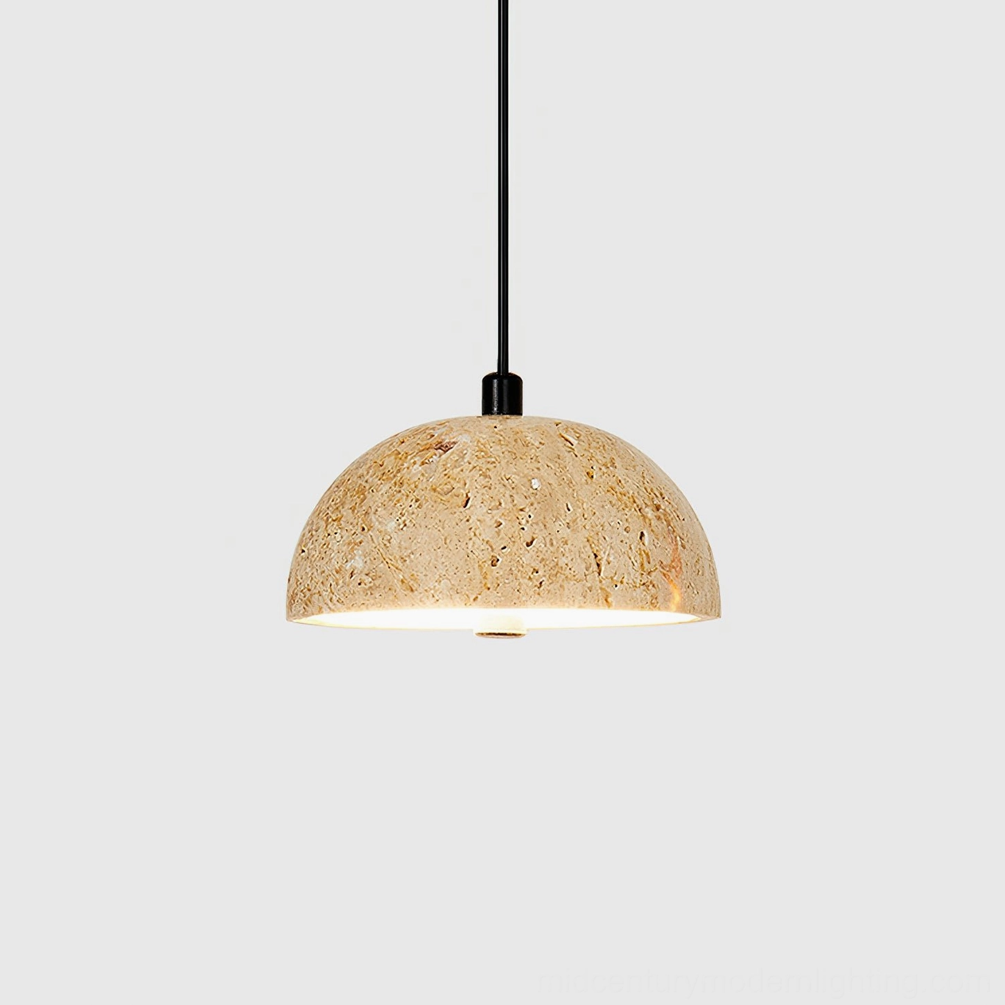 Morphe travertine dome pendant light bottom view glowing LED fixture black hardware