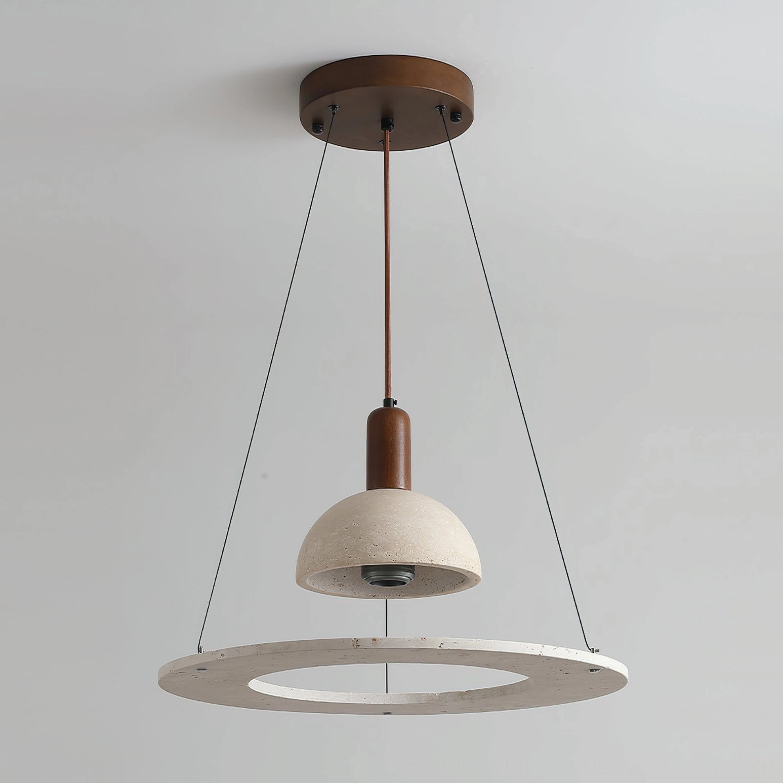 Bottom-up view of travertine dome pendant light showing sculptural form and detailed minimalist design
