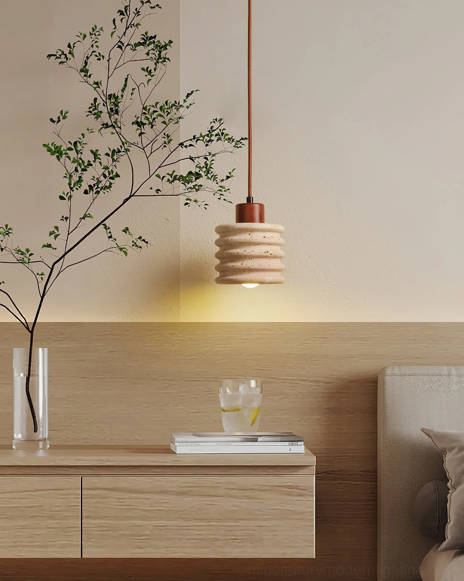 Travertine stone pendant installed in bedroom dresser area, cozy minimalist decor setting
