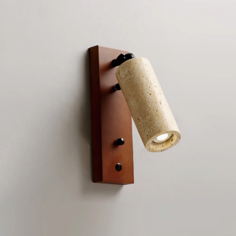 Front side close-up of travertine sconce with warm natural tone, dark brown wood base, and cylindrical stone shade