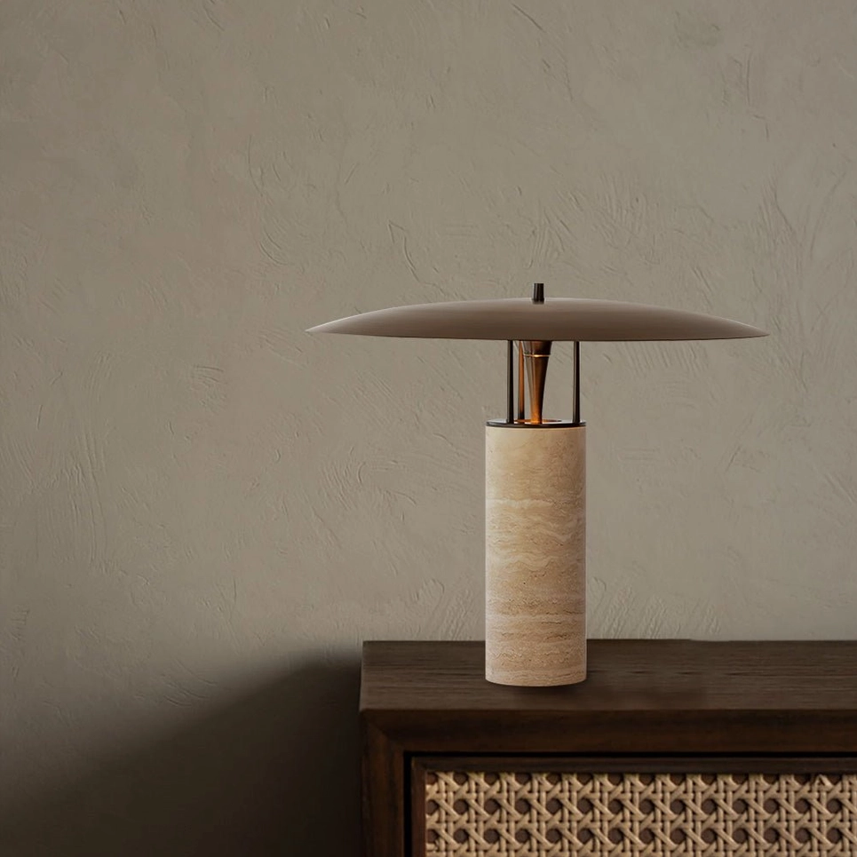 Travertine table lamp on dark wood cabinet with rattan panel detail, contemporary furniture arrangement