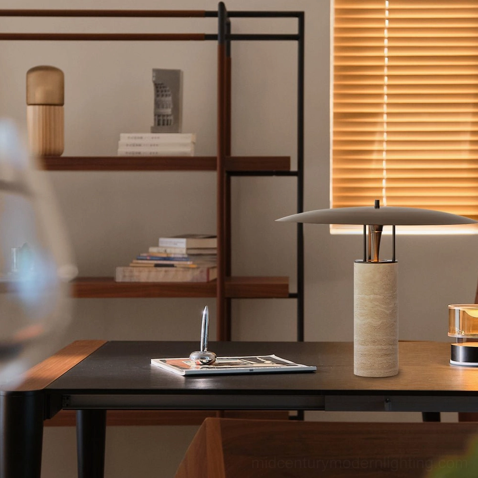 Travertine table lamp in home office workspace with metal bookshelf and venetian blinds backdrop, professional lighting