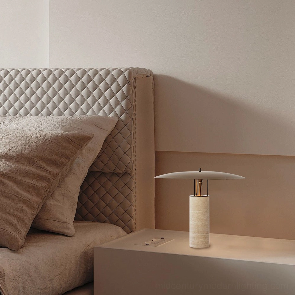 Travertine table lamp detail shot showing natural stone texture and material quality, minimalist design aesthetic