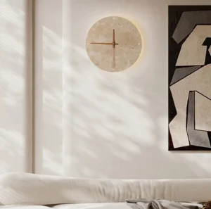 Travertine clock lamp mounted in modern bedroom with soft bedding creating warm ambient lighting