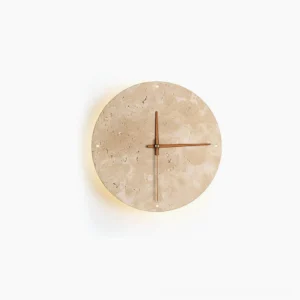 Travertine wall clock lamp with minimalist wooden hands and warm LED glow on white background