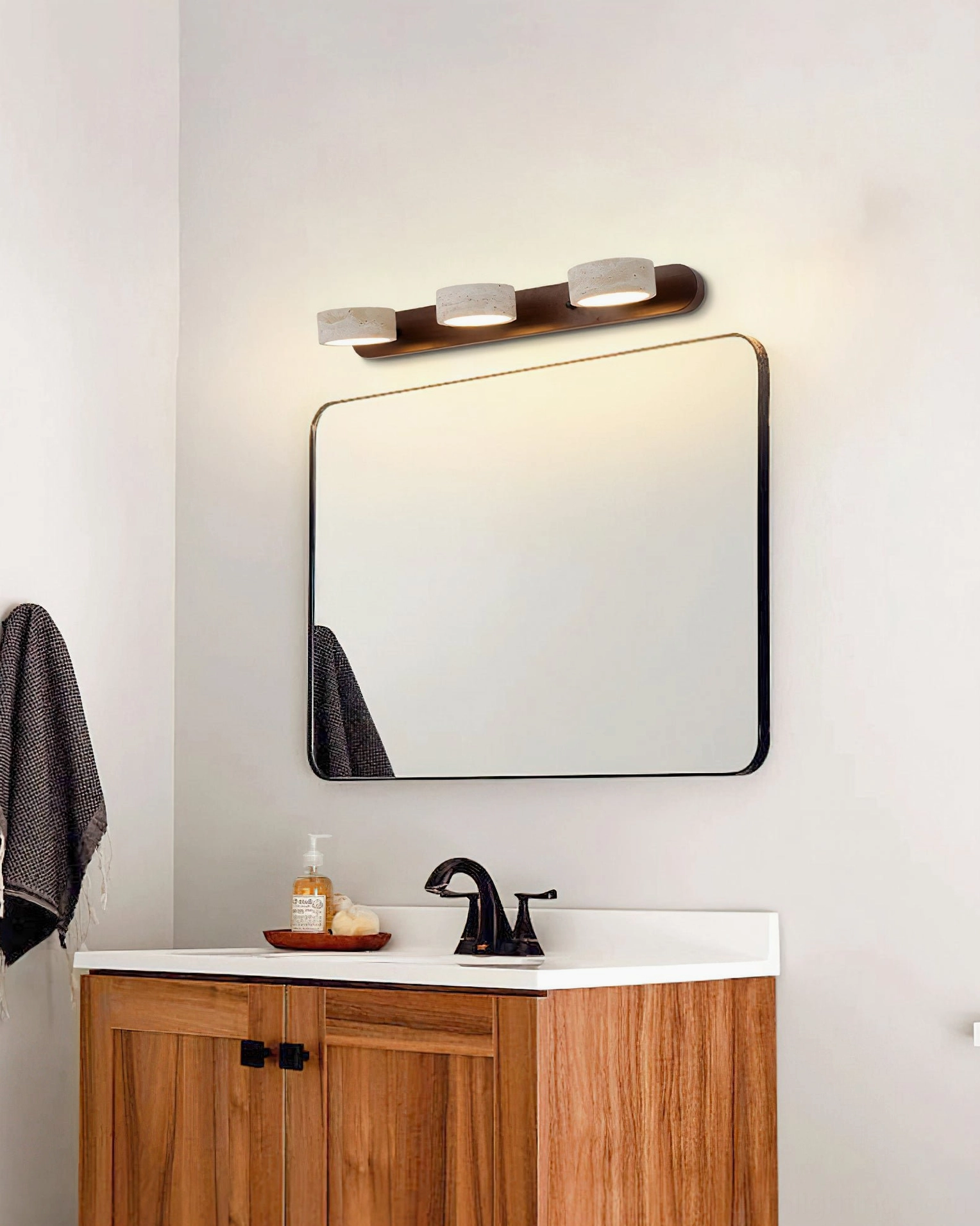 3-head travertine wall sconce dark brown metal base rectangular mirror bathroom